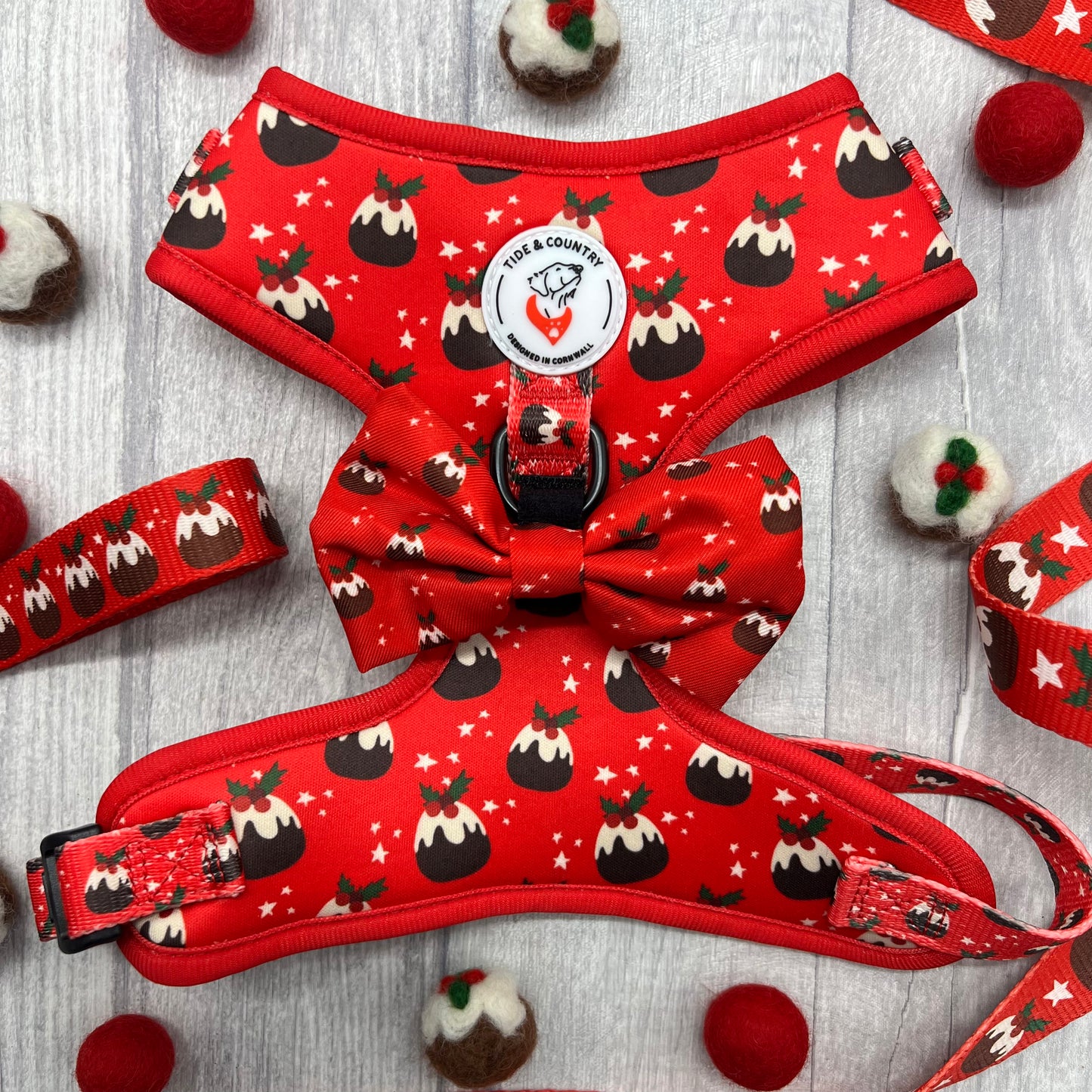 Red Christmas dog harness and matching bow tie with Christmas puddings print