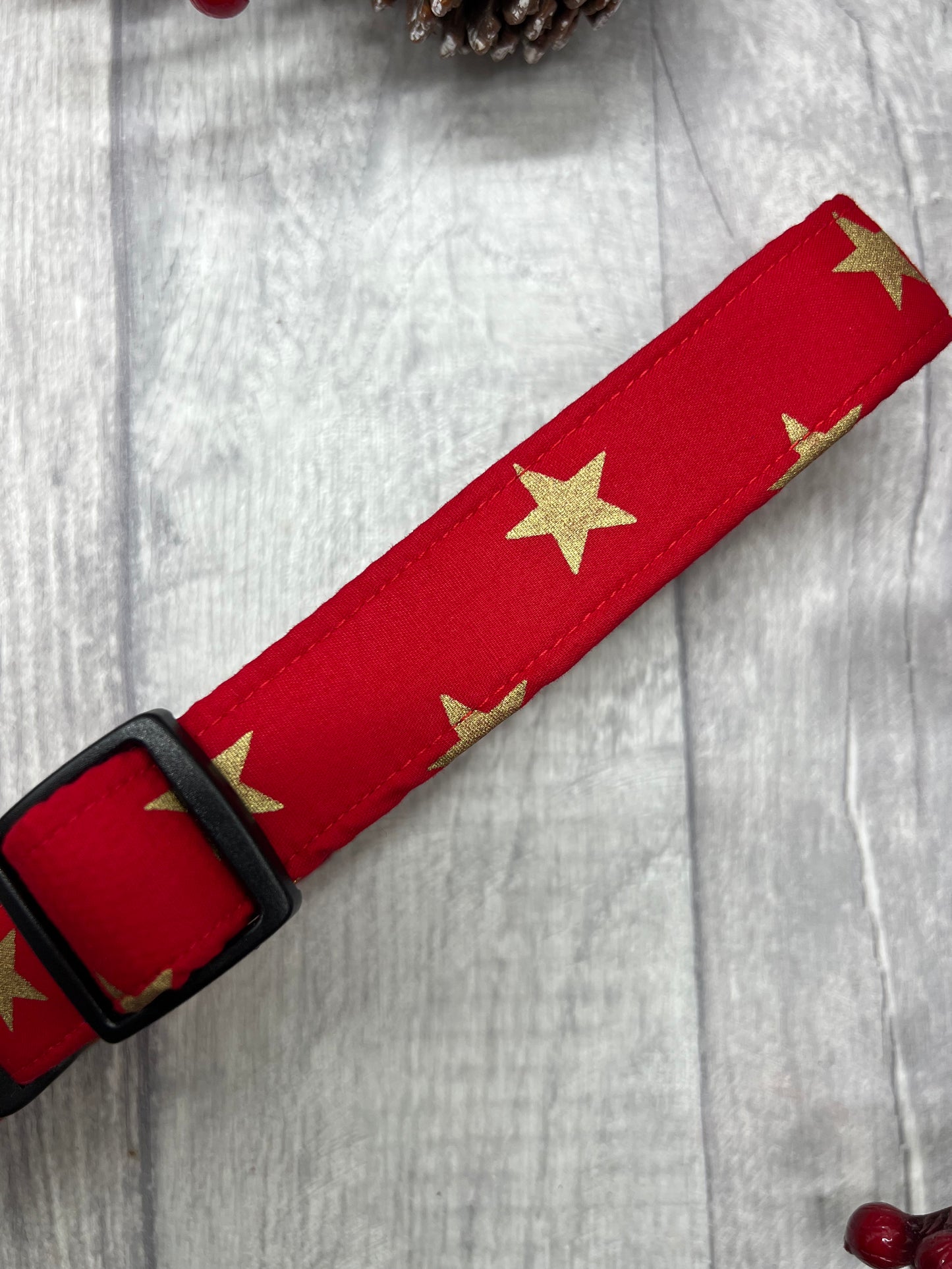 Christmas gold star on red dog collar