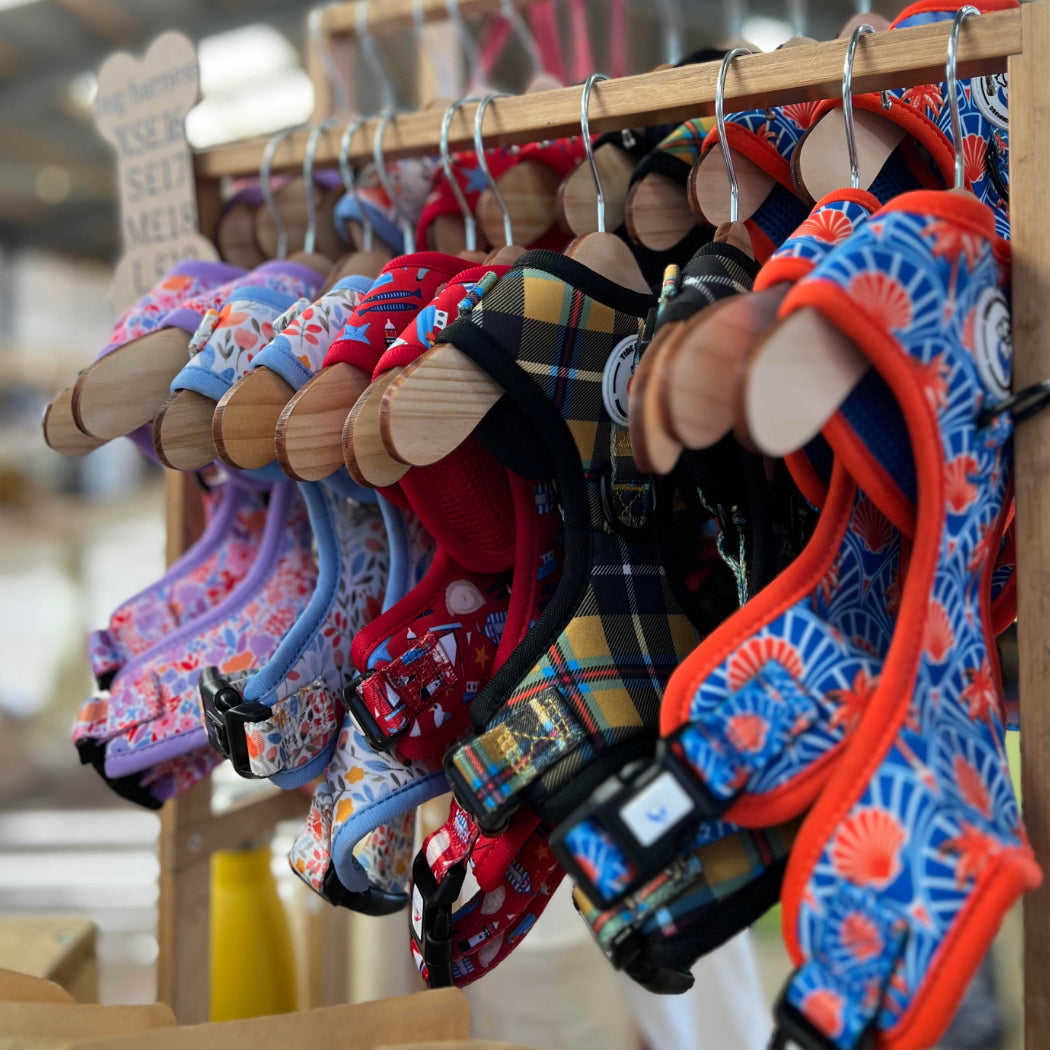 Selection of Tide & Country dog harnesses on display in store